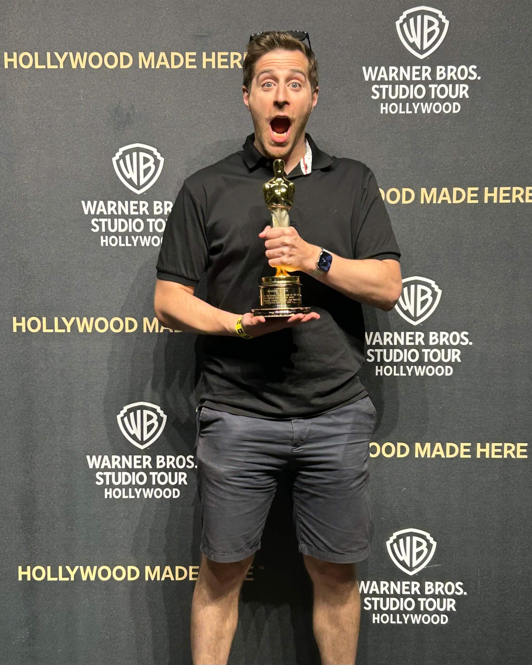 Holding an Oscar!